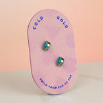 pink backer card holding aquamarine earrings geometric gold-plated stud earrings march birth stone present jewelry