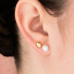model wearing gold pearl earring in second hole and freshwater pearl with crystals