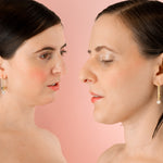 girls wearing matching structured delicate gold threader earrings adorned with minimal baroque freshwater pearl and gold screw ball closure