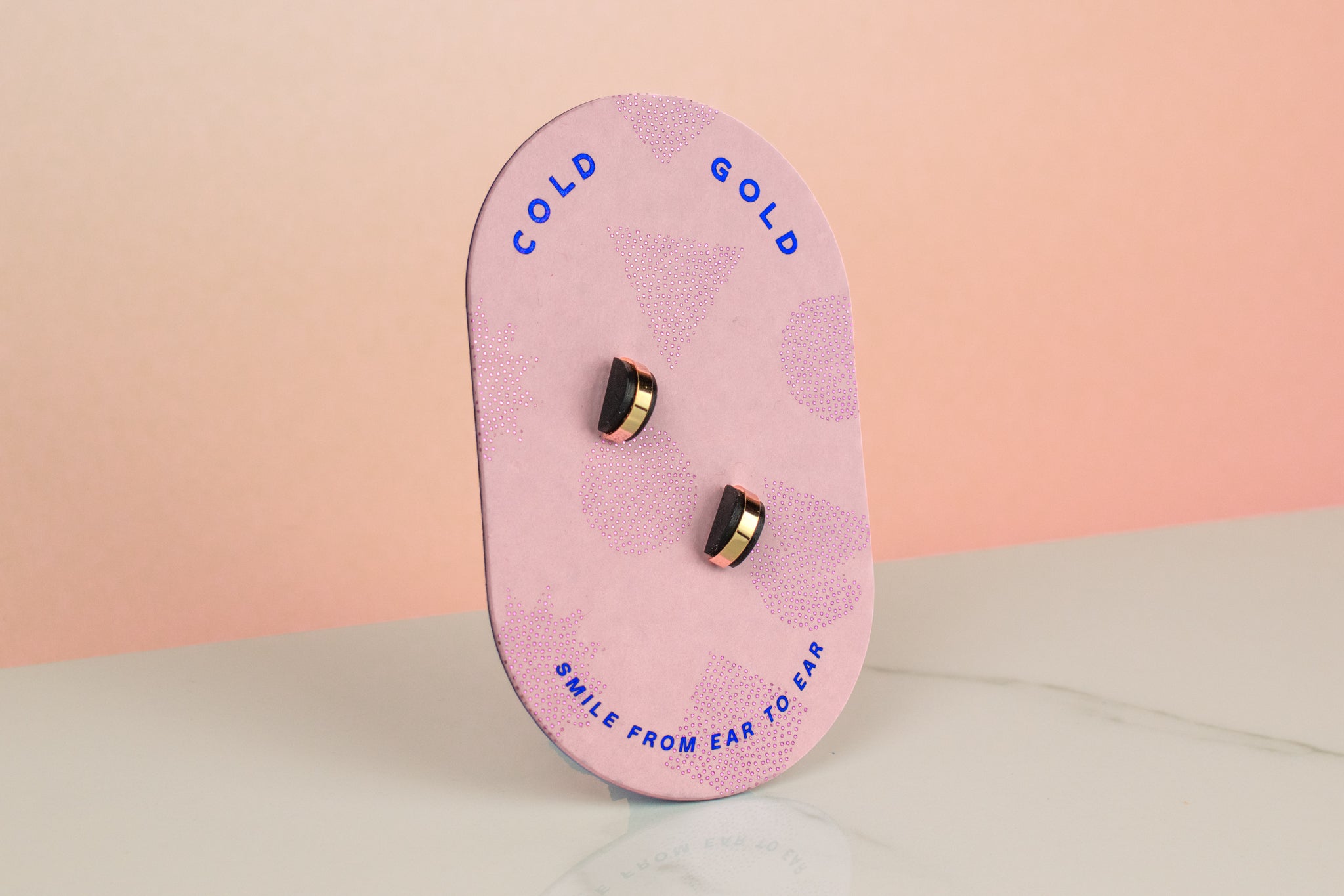 light pink geometric card holding black stud earring set geometric gold-plated stud earrings present jewelry