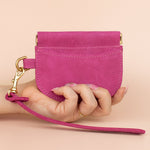 small leather card wallet in magenta pink with gold hardware