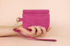 small leather card wallet in magenta pink with gold hardware