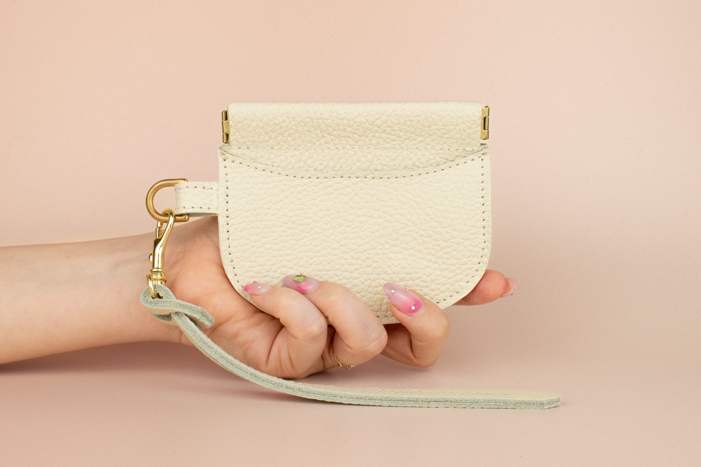 bone white small leather wristlet with gold hardware