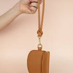 neutral pebble grain leather brown slim wristlet mini wallet with exterior pocket, gold hardware, and detachable wristlet