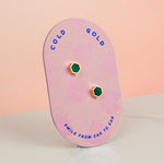 light pink cold gold card displaying forrest green clay hexagon gold plated stud