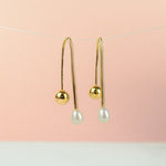 simple modern structured gold wire drop earrings with freshwater iridescent pearl