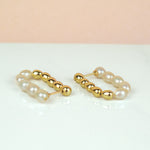 string of baroque freshwater pearl hoop earrings