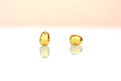 close up of 6mm golden pearl earrings embellished with rainbow gemstones sterling silver posts