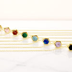 set of gold hexagon necklaces marbled clay jewelry 14k gold chain delicate short necklaces in crystal quartz, rose quartz, emerald, aquamarine, sapphire, and amethyst