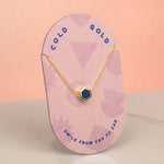 pink card displaying 14k gold plated blue gemstone inspired dainty necklace september birthstone gifts for her