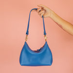 90's style chic leather baguette bag in bright blue