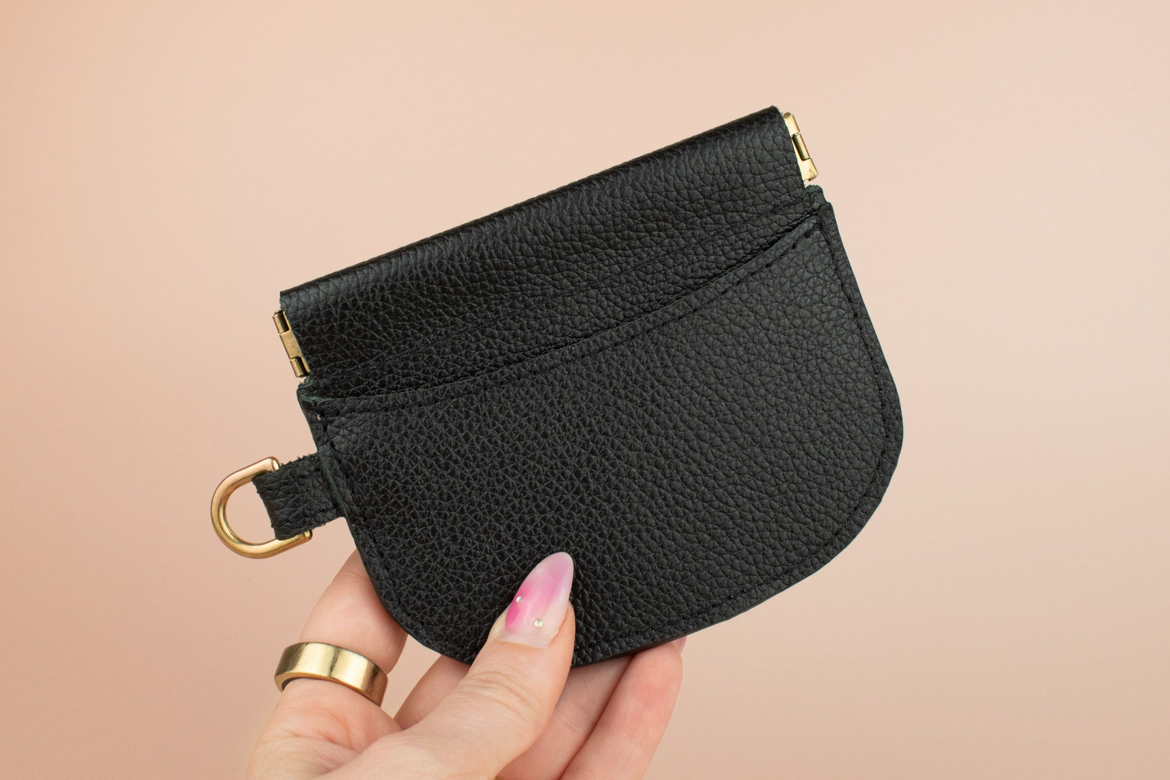 slim modern cardholder in black, leather card wallet case with gold hardware exterior card pocket