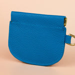 back of bright blue compact mini leather wallet cardholder with squeeze open sides