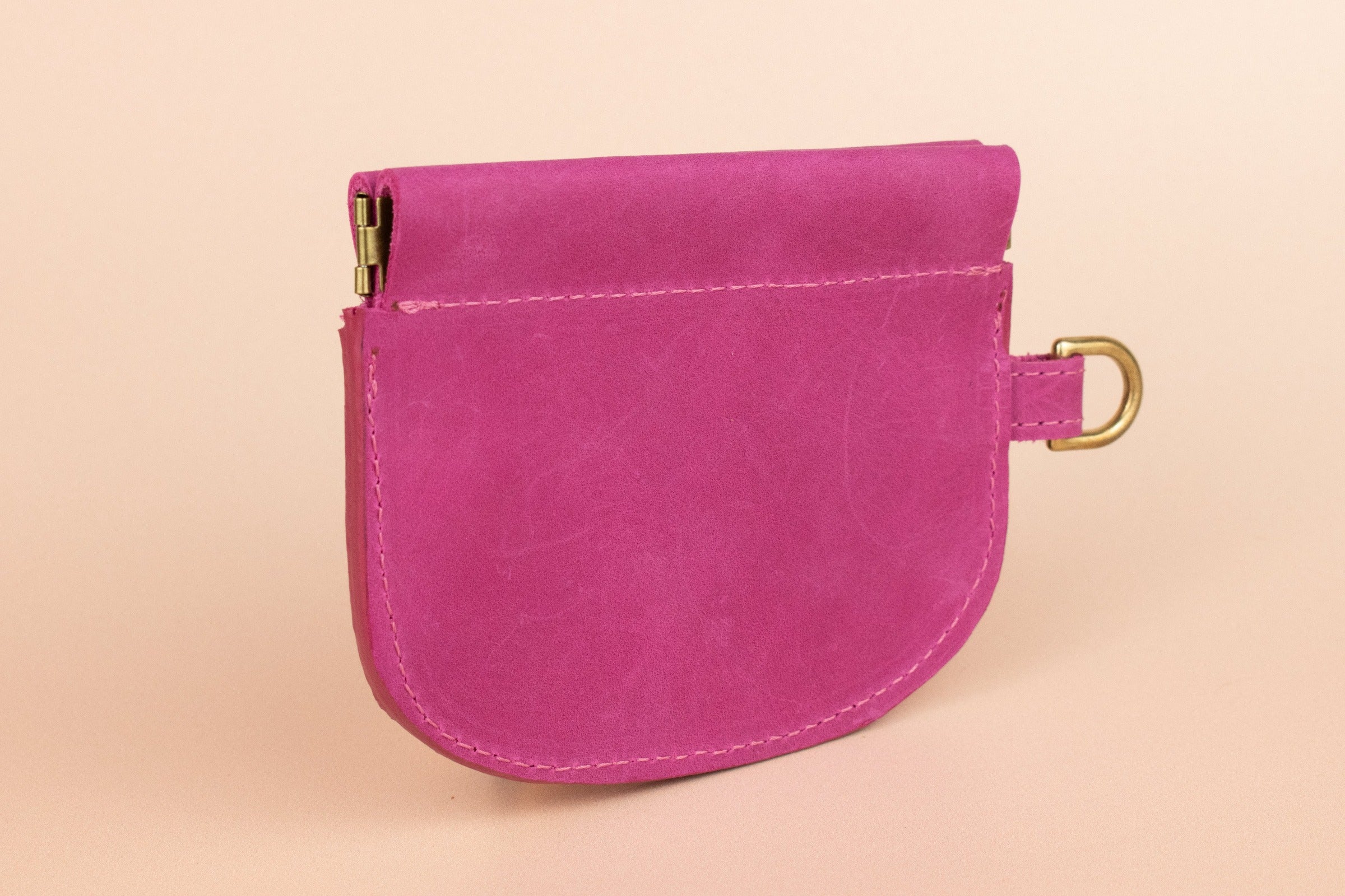 slim handmade nubuck leather wallet card case in magenta pink, squeeze clasp closure
