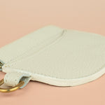 slim bone white leather wallet wristlet with squeeze clasp and gold hardware