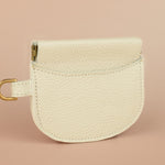 small minimal handmade leather wallet with gold hardware by cold gold, squeeze clasp wristlet wallet