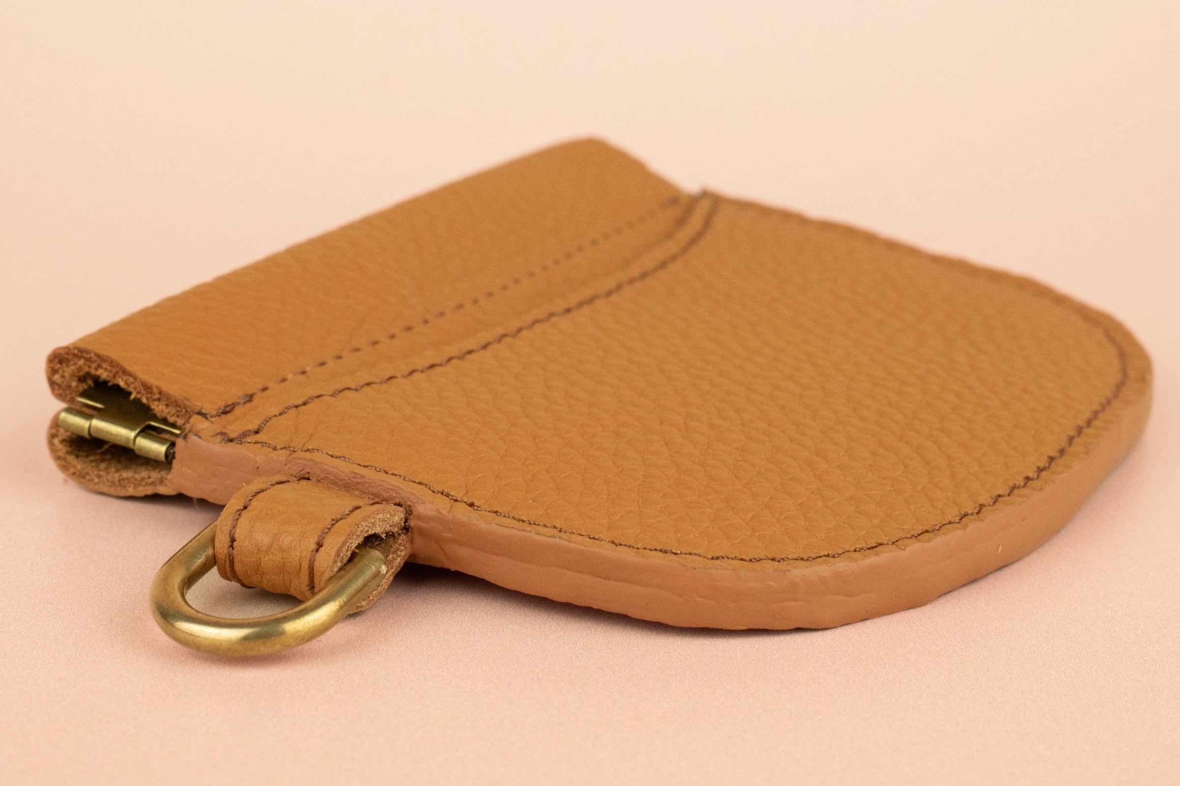 slim neutral compact leather wallet wristlet with exterior card pocket with gold hardware handmade by cold gold 