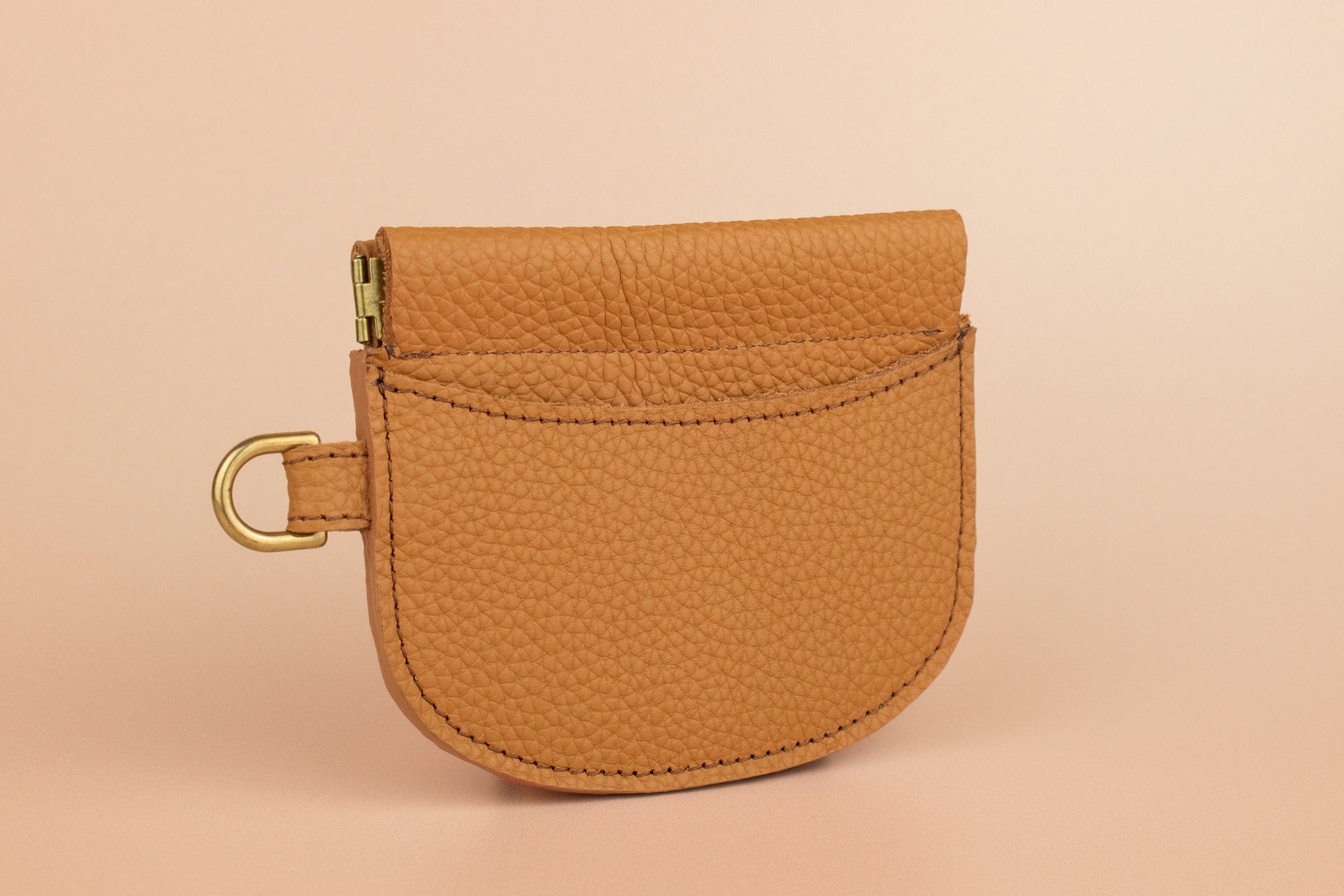 minimal leather card wallet pebble grain leather wristlet in caramel brown with squeeze clasp 