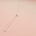 long silver lariat box chain necklace with adjustable sliding bead