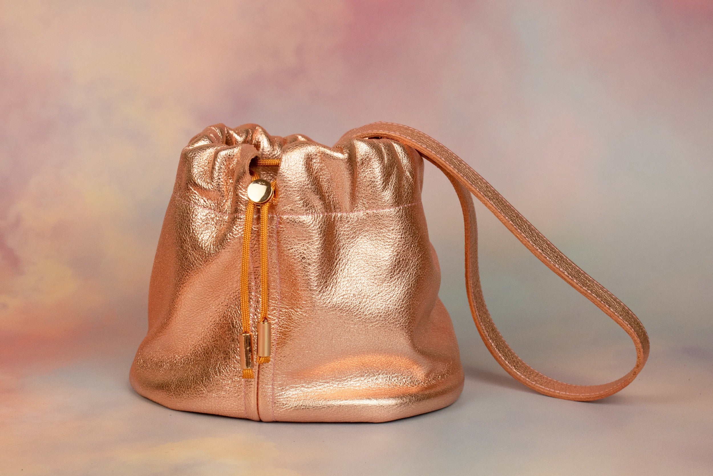 trending mini soft leather bucket bag in metallic pink