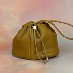 slouchy handmade olive green scrunched top purse with adjustable strap