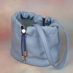 periwinkle bag with ruched drawstring closure