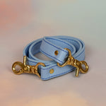 matching periwinkle strap equipped with clasps