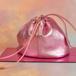 trending slouchy ruched top shiny metallic leather pouch purse