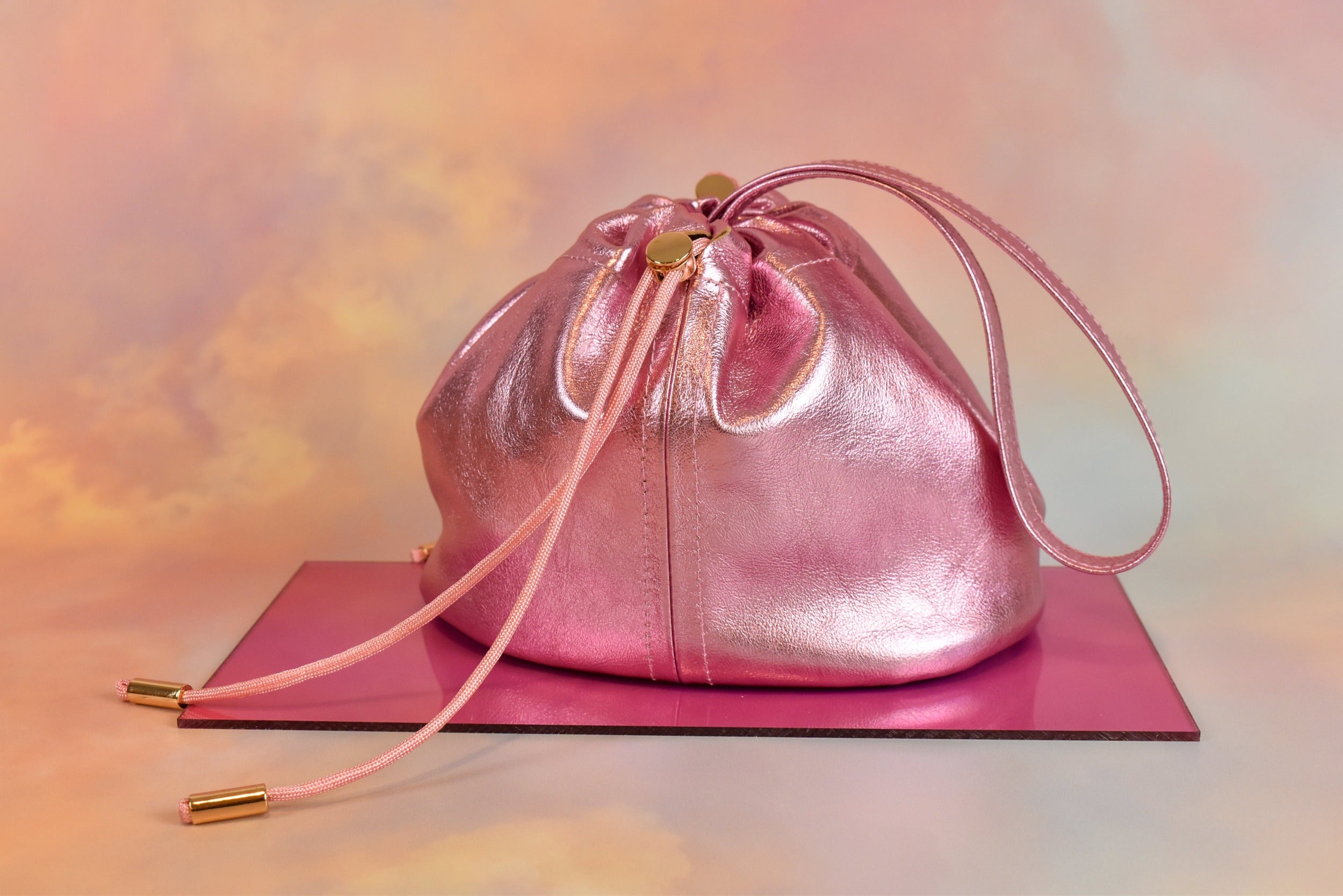 trending slouchy ruched top shiny metallic leather pouch purse