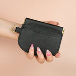 modern slim black leather cardholder with exterior pocket and central compartment