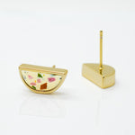 detail shot of gold half circle earrings with cream clay and chips of amber, rose quartz, and olive stone in terrazzo pattern