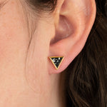 close up of models ear wearing everyday black terrazzo and gold earrings