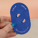blue pill shaped card with celestial stud earrings in petal pink marble