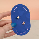 lightweight statement stud earrings in soft pink marbling.