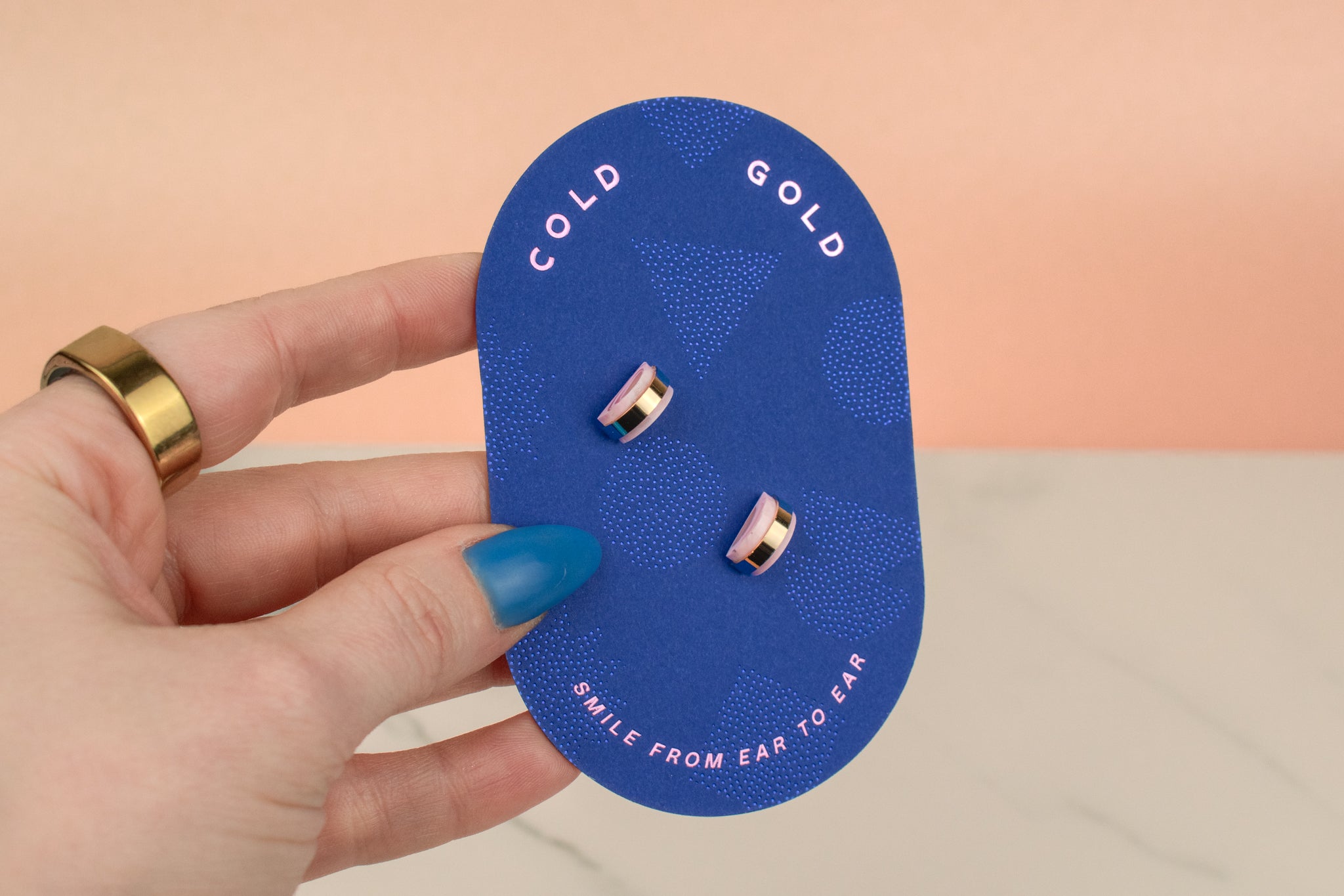 lightweight statement stud earrings in soft pink marbling.