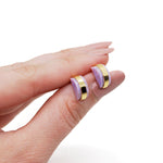 geometric polished brass marbled stud set.