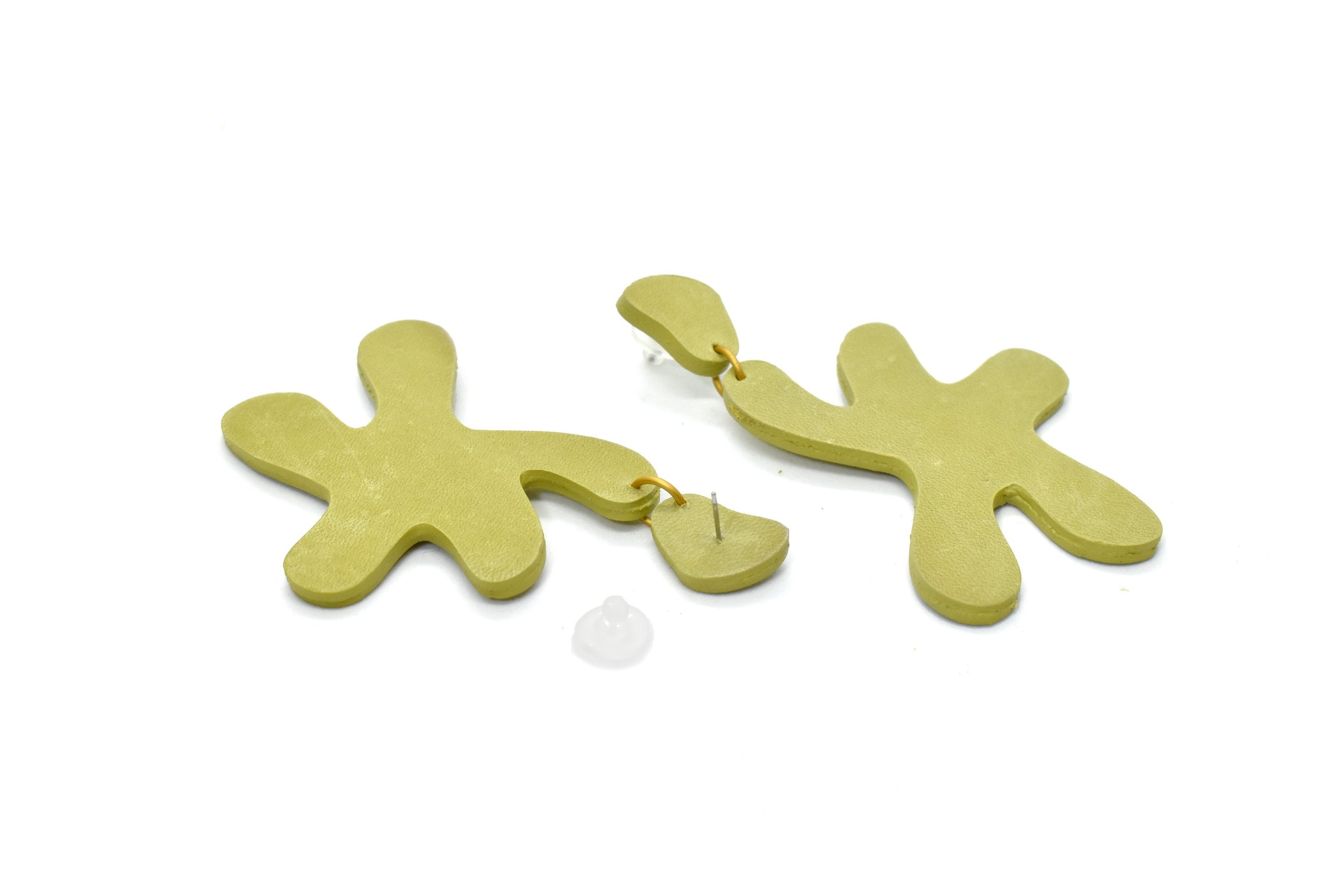 lime green accessories that are star shaped statement earrings made of real leather in chartreuse style