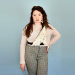 a woman wears a cow print leather purse for music festival essentials bag small leather sling bag crossbody cowhide leather purse cowprint gift for bridesmaids sling bag with inner pocket