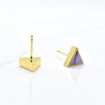 pastel purple clay and gold triangle earring set shown with one overturned. The back of the stud is smooth, gold, and gold plated in 14k gold