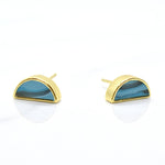 gold triangle stud earring set in aquamarine gemstone clay shown from the front