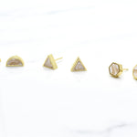 three sets of small quartz crystal and gold earring set gold stud gemstone earrings in three shapes: half moon, triangle, and hexagon