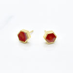 ruby and gold stud earrings with 24k gold geometric shapes and hand marbled polymer clay gemstone on white background