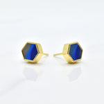 blue and gold hexagon stud earring set with swirling sapphire texture and 14k gold hexagon shape against a white background