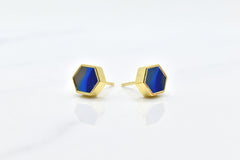 blue and gold hexagon stud earring set with swirling sapphire texture and 14k gold hexagon shape against a white background