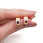 marbled translucent pink geometric shape studs.