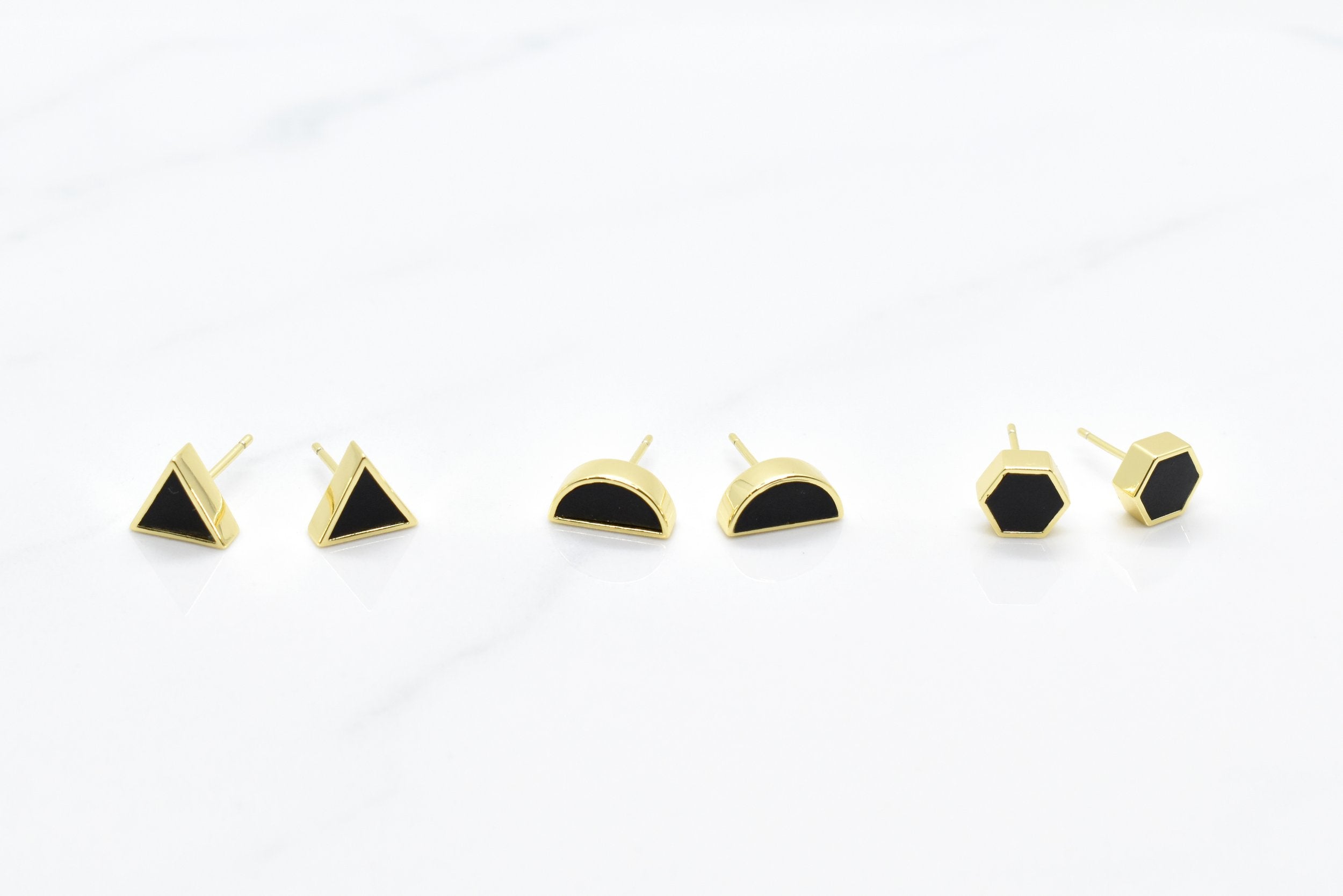 a set of three geometric gold studs delicate modern triangle earrings black obsidian and 14k gold plated sterling silver