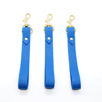 minimal leather key chain wristlet loop in gold and matisse blue.