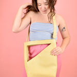 butter yellow crossbody bag for laptops geometric cutout