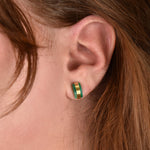 model wearing emerald jade studs gold geometric earring gold studs architectural jewelry simple studs
