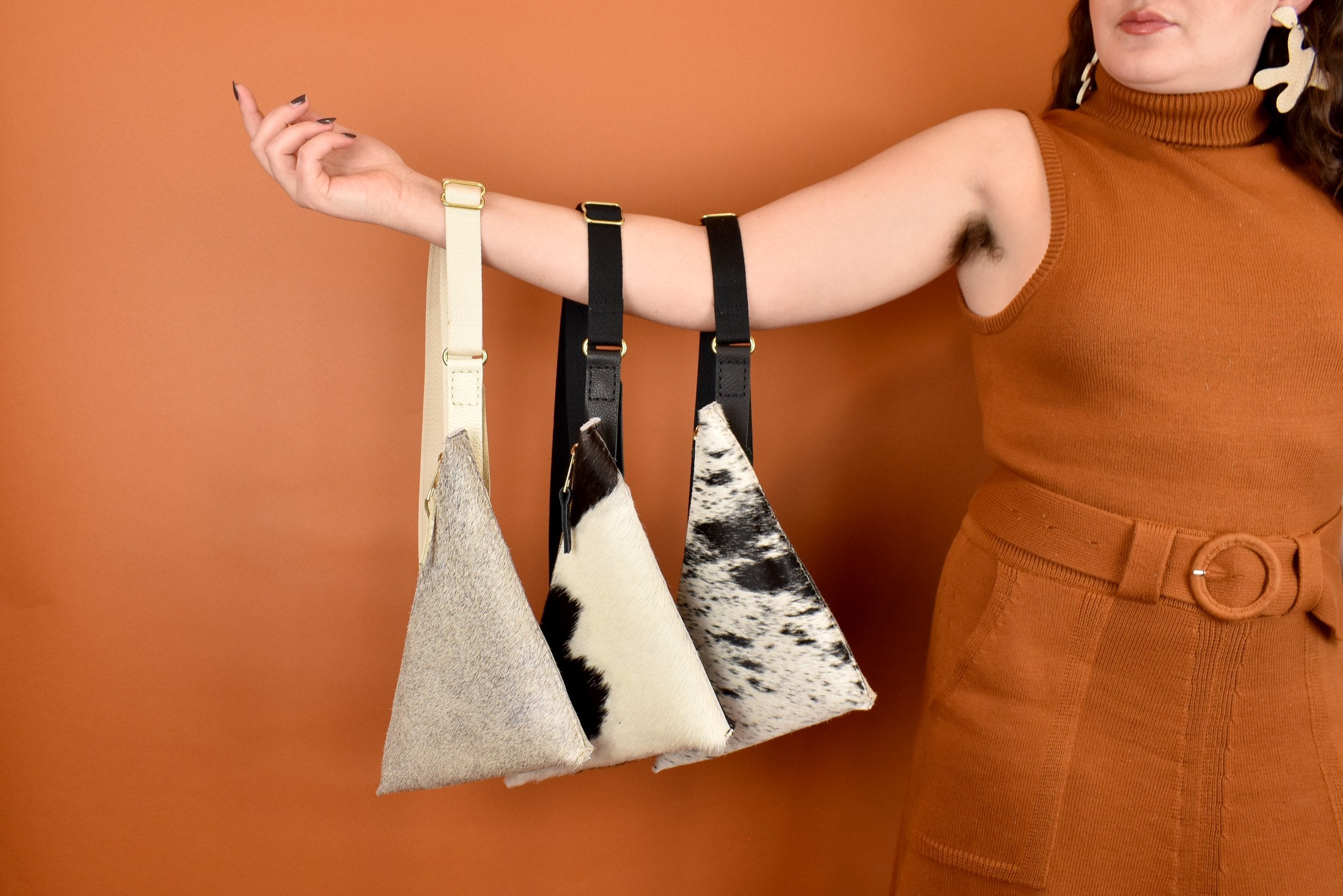 hair-on-hide leather sling bag leather bag crossbody black and white clutch accessory perfect bag for nashville bachelorette party favors